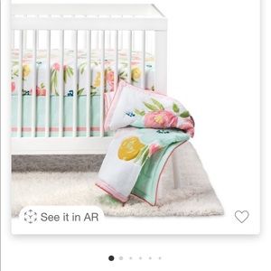 Cloud Island Floral Field four piece crib set.